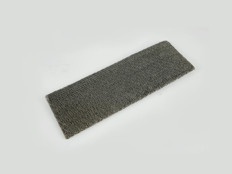 a flat square-shaped compressed knitted mesh filter used for liquid fuel cell application