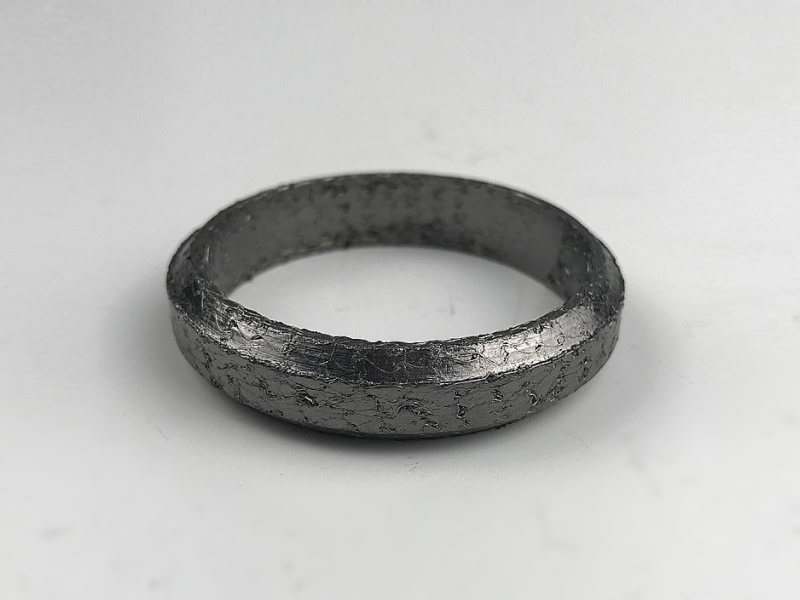 a special ring-shaped compressed knitted mesh filter combined with graphite