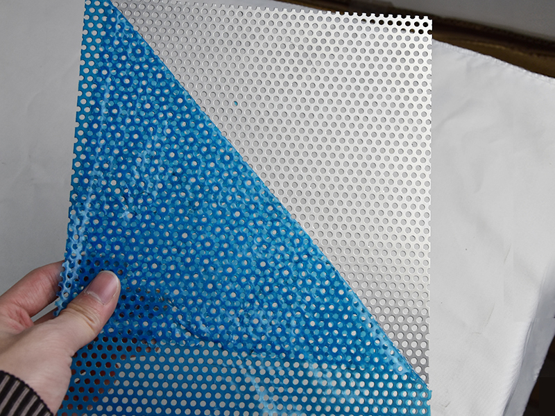 perforated plates with blue protective plastic film
