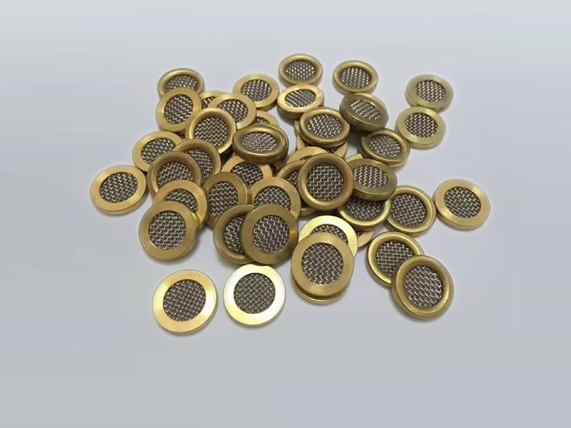 several pieces of wire mesh filter disc with brass frame to prevent wires loose