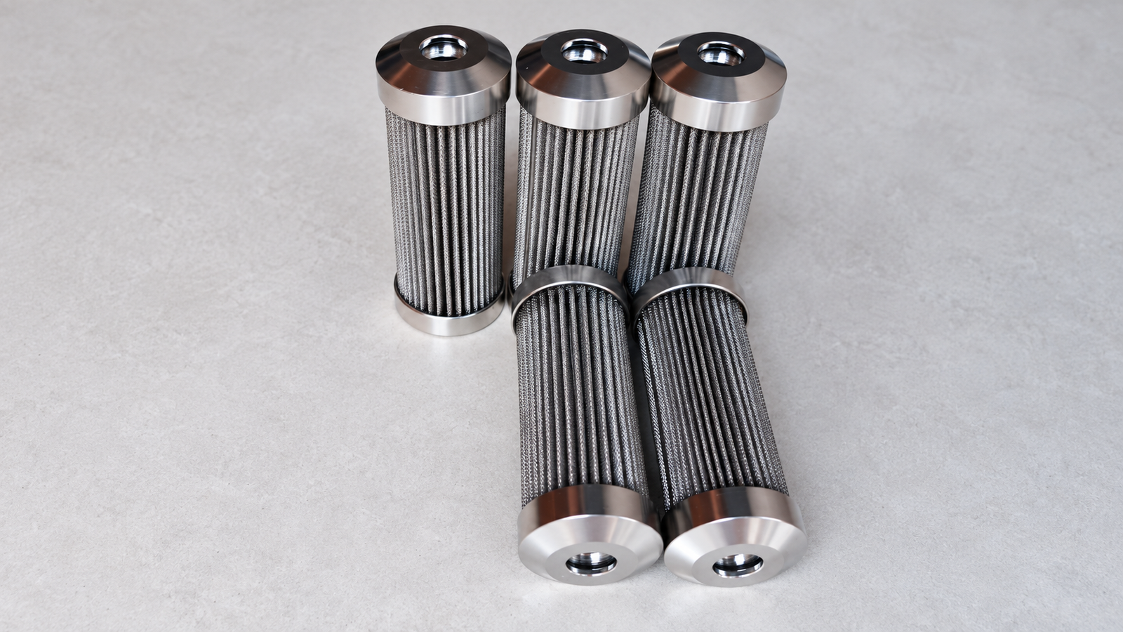Pleated Sintered Wire Mesh Filter Cartridges Five pleated sintered wire mesh filter cartridges with metal end fittings