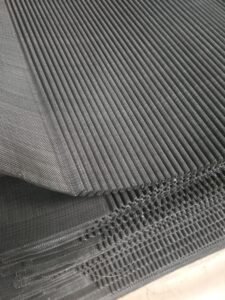 Pleated sintered wire mesh sheets during fabrication