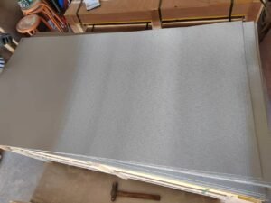 Sintered nickel fiber felt sheets with single-sided wire mesh support