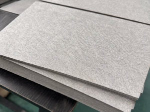 Surface texture and stacked sheet edges of sintered titanium fiber felt