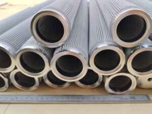 Open ends and pleated mesh surfaces of stainless steel filter cartridges