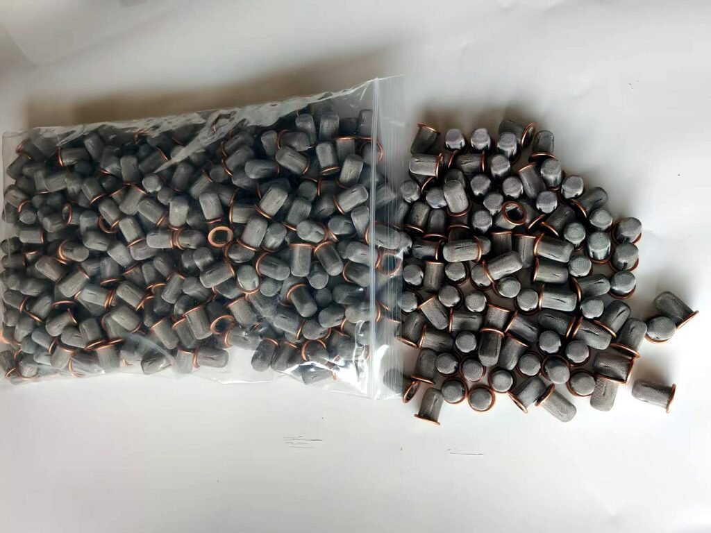 Batch of small cup-shaped wire mesh filter caps with metal rims