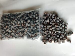 Batch of small cup-shaped wire mesh filter caps with metal rims