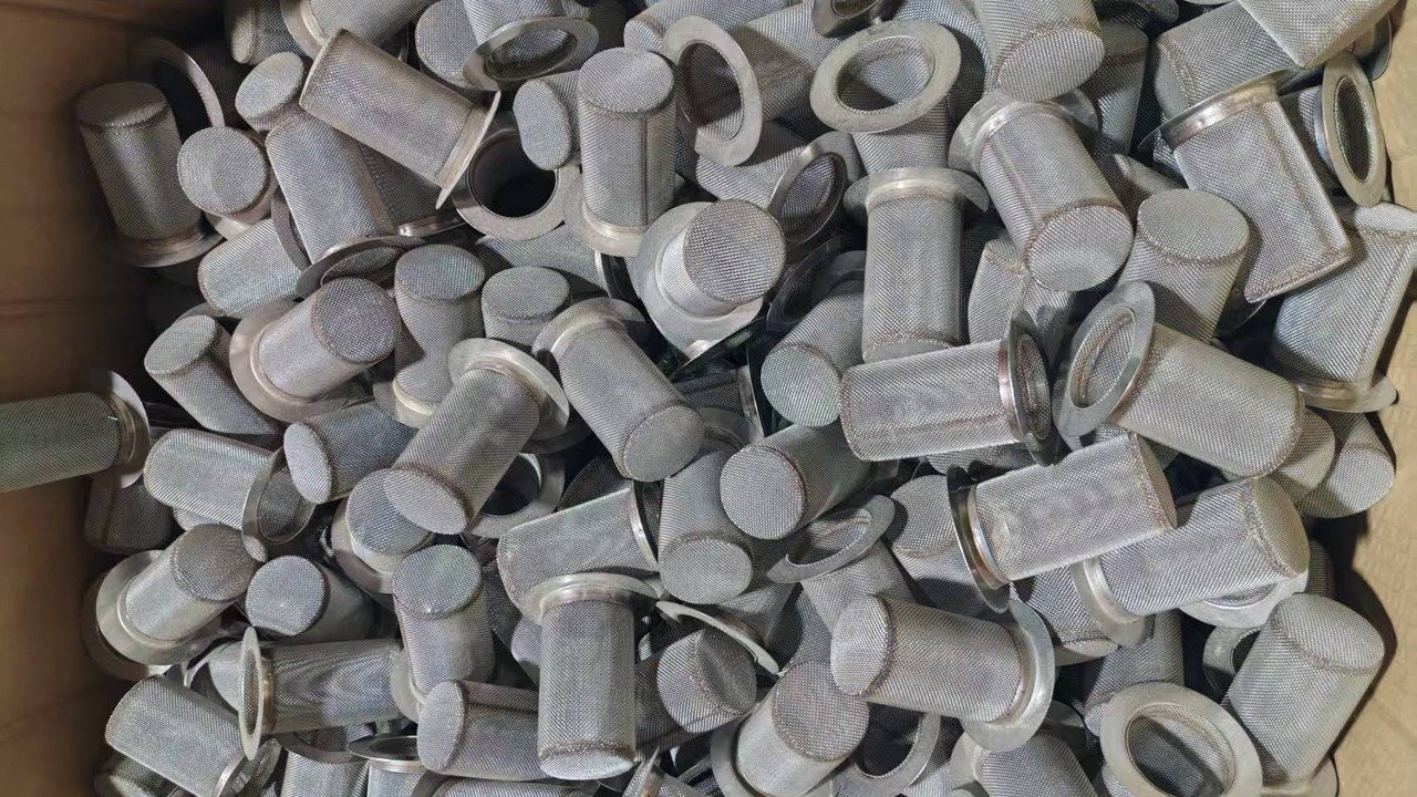 Semi-finished flanged wire mesh parts during fabrication.