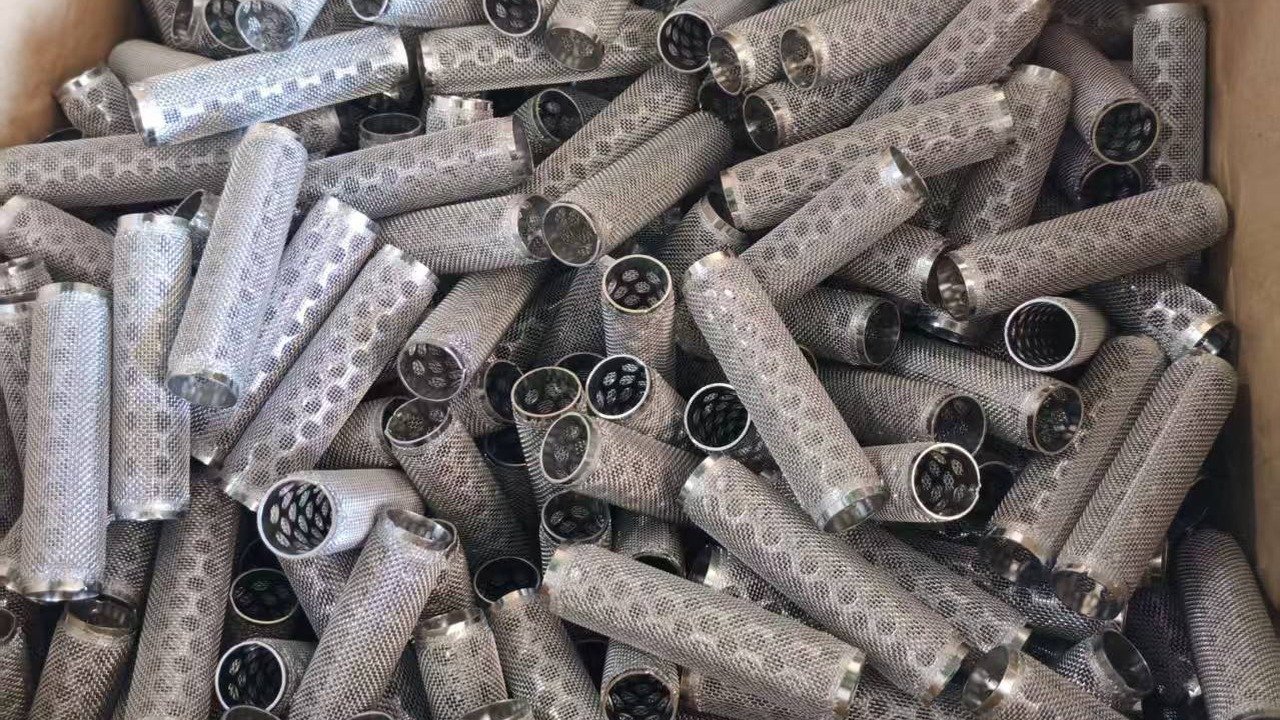Semi-finished mesh cylinders with perforated supports.